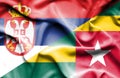 Waving flag of Togo and Serbia