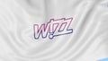 Waving flag of Wizz Air against blue sky background, seamless loop. Editorial 4K animation