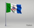 Waving flag of Yukon - province of Canada on flagpole. Template Royalty Free Stock Photo