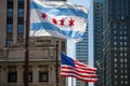 Waving flags of the city of Chicago and of the United States of