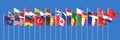 The 28 waving Flags of NATO Countries - North Atlantic Treaty. Isolated on sky background - 3D illustration