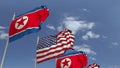 Waving flags of North Korea and the USA, 3D rendering Royalty Free Stock Photo