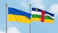 Waving flags of Ukraine and Central African Republic on sky background. Illustrating International Diplomacy, Friendship and