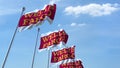 Waving flags with Wells Fargo logo against sky, editorial 3D rendering