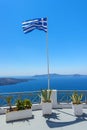 Waving Greek Flag in Santorini Royalty Free Stock Photo