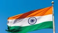 Waving Indian flag flying high, symbol of pride and freedom generated by AI Royalty Free Stock Photo