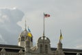 Waving Malaysia flag at rooftop City Hall.