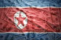 waving north korea flag on a american dollar money background Royalty Free Stock Photo