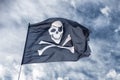 Waving pirate flag jolly roger Royalty Free Stock Photo