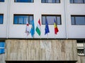 Waving Romanian, Hungarian, Szekler and European Union flags