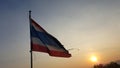 Waving Thailand flag with sunset in the twilight time.