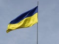 waving in the wind yellow-blue flag of Ukraine against the sky Royalty Free Stock Photo