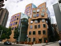 Wavy brick facade of Dr Chau Chak Wing Building with array of rectangular windows at University Technology Sydney UTS, Australia