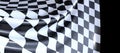 Wavy checkered flag under the lights isolated on a black background