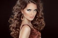 Wavy Hair. Beautiful Brunette Woman. Healthy Long Brown Hai