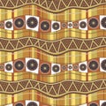 Wavy lines with an ornament on a background of vertical multi-colored stripes. Seamless pattern in brown-ocher colors Royalty Free Stock Photo