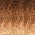 Wavy ombre hair texture from caramel brown to honey blonde Royalty Free Stock Photo