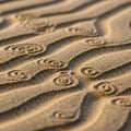 Wavy patterns in the sand with spirals provide a textured artistic effect Royalty Free Stock Photo