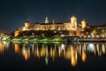 Wawel Castle as seen from another bank of Vistula. Krakow is the most famous landmark in Poland. Night view Royalty Free Stock Photo