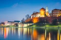 Wawel Castle in the evening in Krakow with reflection in the river, Poland