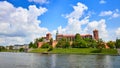 Wawel castle - famous landmark in Krakow Poland. Picturesque landscape on coast Vistula river during the sunny day Royalty Free Stock Photo