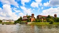 Wawel castle - famous landmark in Krakow Poland. Picturesque landscape on coast Vistula river during the sunny day Royalty Free Stock Photo