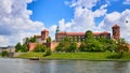 Wawel castle - famous landmark in Krakow Poland. Picturesque landscape on coast Vistula river during the sunny day Royalty Free Stock Photo