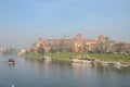 POLAND, KRAKOW - NOVEMBER 2018: Wawel Castle in the morning fog in Krakow, Poland Royalty Free Stock Photo