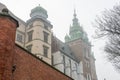 Wawel Castle in the morning fog in Krakow, Poland Royalty Free Stock Photo