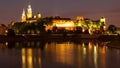 Wawel Hill above Vistula River in Krakow at night Royalty Free Stock Photo