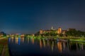 Wawel Royal Castle surrounded by a lake in the evneing in Krakow, Poland Royalty Free Stock Photo