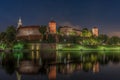 Wawel Royal Castle surrounded by a lake in the evneing in Krakow, Poland Royalty Free Stock Photo