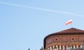 Wawel Royal Castle. Thieves Tower with the flag of Poland on the top