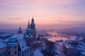 Wawel Royal Castle in winter. Snow on roofs of Wawel castle cathedral and Vistula river in Krakow Poland Royalty Free Stock Photo