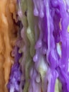 Wax droplet closeup. Colorful melted candle drips in shape of solid drops. Pastel shades abstract wax texture.