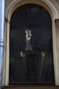 Wax figure of Charlie Chaplin in the window, view from the street