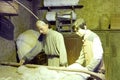 Wax figure of workers producing cotton quilts core, adobe rgb