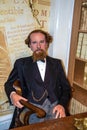 Wax figure of world-famous British writer Charles Dickens at Madame Tussauds museum. London