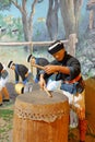 Wax figure of Zhuang farmers playing drum in Anthropology Museum Of Guangxi, adobe rgb