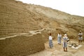 Wax figures of ancient people paying tribute to the gods in Huaca Pucllana pre Inca ruins in Miraflores district, Lima, Peru