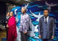 Wax figures of Nelson Mandela, Dalai Lama , Martin Luther King, Jr. in Madame Tussauds museum in London.