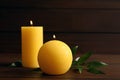 Wax yellow candles of different shapes