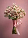 Waxflower wedding bouquet blurred background