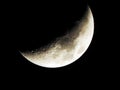 Waxing Crescent Moon in night sky Royalty Free Stock Photo
