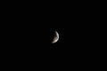 Waxing crescent Moon the night sky Royalty Free Stock Photo