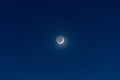 Waxing crescent moon and starry sky Royalty Free Stock Photo