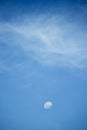 A waxing gibbous daytime moon in the evening sky Royalty Free Stock Photo