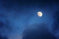 Waxing gibbous moon on cloudy sky Royalty Free Stock Photo