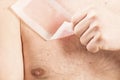 Waxing man torso depilation Royalty Free Stock Photo