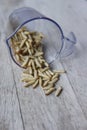 Waxworms in a measuring cup Royalty Free Stock Photo